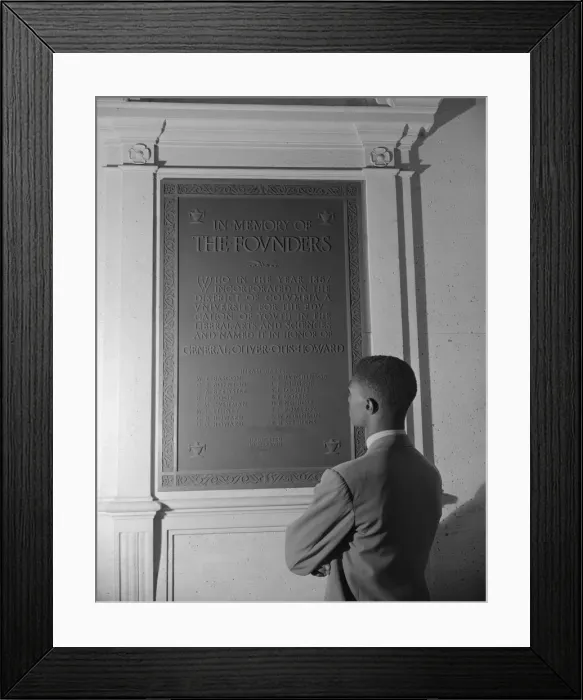 Framed Print : Student reading bronze plaque in library of Howard University, Washington, D. C. 1942. Creator: Gordon Parks Framed Print : Student reading bronze plaque in library of Howard University, Washington, D. C. 1942. Creator: Gordon Parks