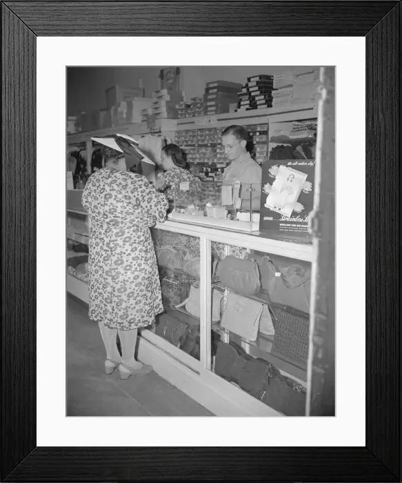 Framed Print : Shopper in a store at 7th Street and Florida Avenue, N. W. Washington, D. C. 1942. Creator: Gordon Parks Framed Print : Shopper in a store at 7th Street and Florida Avenue, N. W. Washington, D. C. 1942. Creator: Gordon Parks