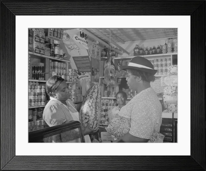 Framed Print : Housewife bargaining in the store owned by Mr. J. Benjamin, Washington, D. C. 1942. Creator: Gordon Parks Framed Print : Housewife bargaining in the store owned by Mr. J. Benjamin, Washington, D. C. 1942. Creator: Gordon Parks