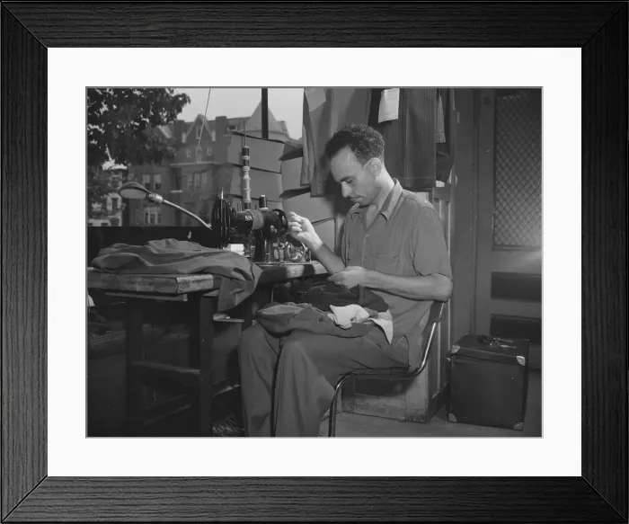 Framed Print : A tailor in Franks cleaning and pressing establishment altering a pair... Washington, D.C. 1942. Creator: Gordon Parks Framed Print : A tailor in Franks cleaning and pressing establishment altering a pair... Washington, D.C. 1942. Creator: Gordon Parks