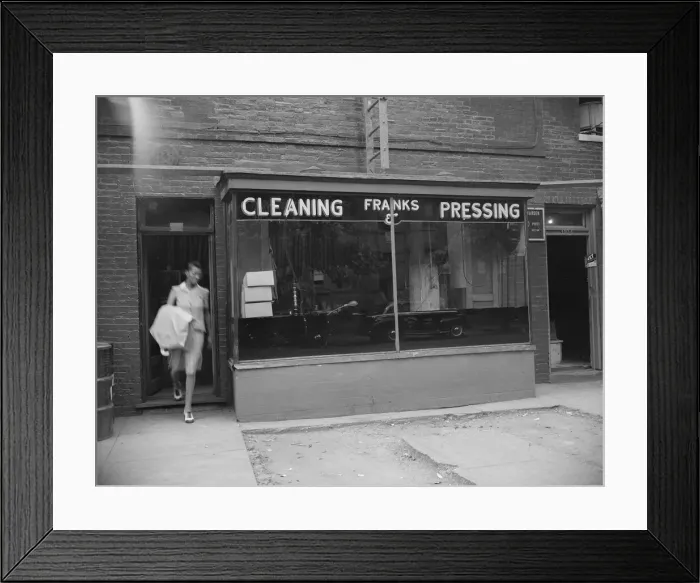 Framed Print : Possibly: A tailor in Franks cleaning and pressing establishment checking... Washington, DC, 1942. Creator: Gordon Parks Framed Print : Possibly: A tailor in Franks cleaning and pressing establishment checking... Washington, DC, 1942. Creator: Gordon Parks