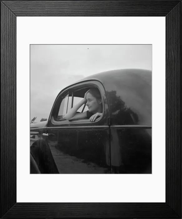 Framed Print : Untitled, 1935-1942. [Woman in a car]. Creator: Unknown