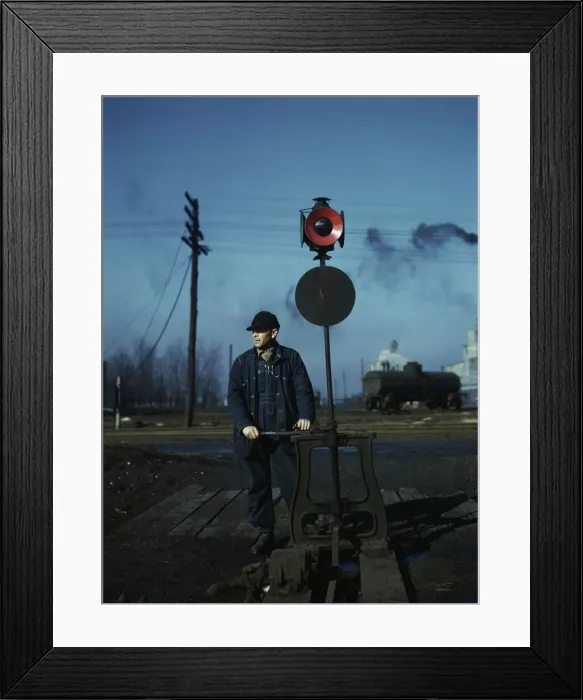 Framed Print : Daniel Senise throwing a switch while at work in an Indiana Harbor Belt Line railroad yard, 1943. Creator: Jack Delano Framed Print : Daniel Senise throwing a switch while at work in an Indiana Harbor Belt Line railroad yard, 1943. Creator: Jack Delano