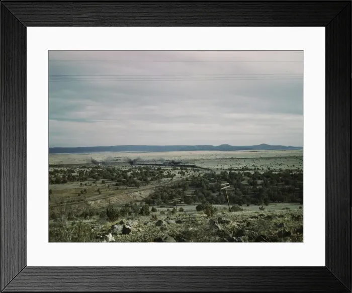 Framed Print : West-bound passenger train going around a curve on the Atchison... near Gleed, Arizona, 1943. Creator: Jack Delano Framed Print : West-bound passenger train going around a curve on the Atchison... near Gleed, Arizona, 1943. Creator: Jack Delano