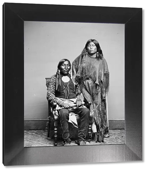 Lone Wolf and his wife Etla, Kiowa Indians, between 1855 and 1865. Creator: Unknown
