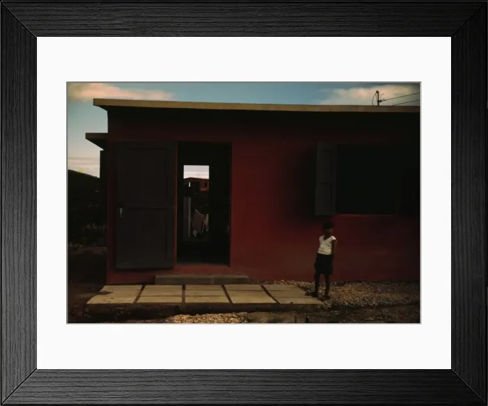 Framed Print : Child of an FSA - R. R. borrower? in front of their house, Puerto Rico, 1941 or 1942. Creator: Jack Delano Framed Print : Child of an FSA - R. R. borrower? in front of their house, Puerto Rico, 1941 or 1942. Creator: Jack Delano