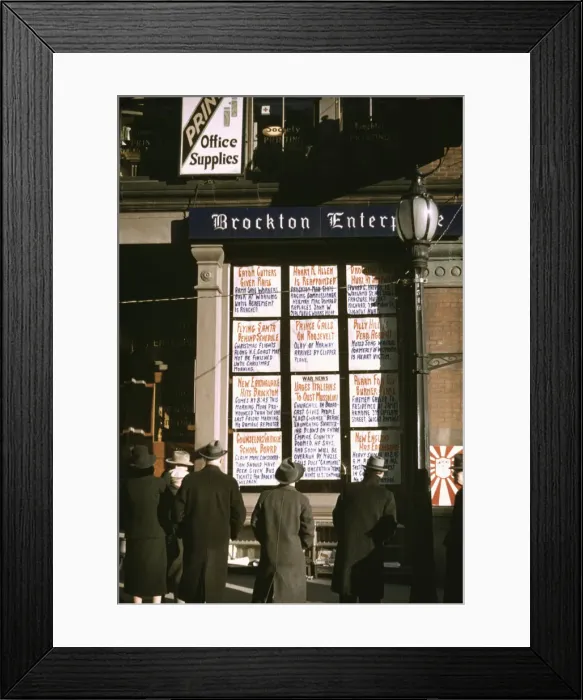 Framed Print : Men and a woman reading headlines posted in street-corner window of Brockton... Mass. 1940. Creator: Jack Delano Framed Print : Men and a woman reading headlines posted in street-corner window of Brockton... Mass. 1940. Creator: Jack Delano