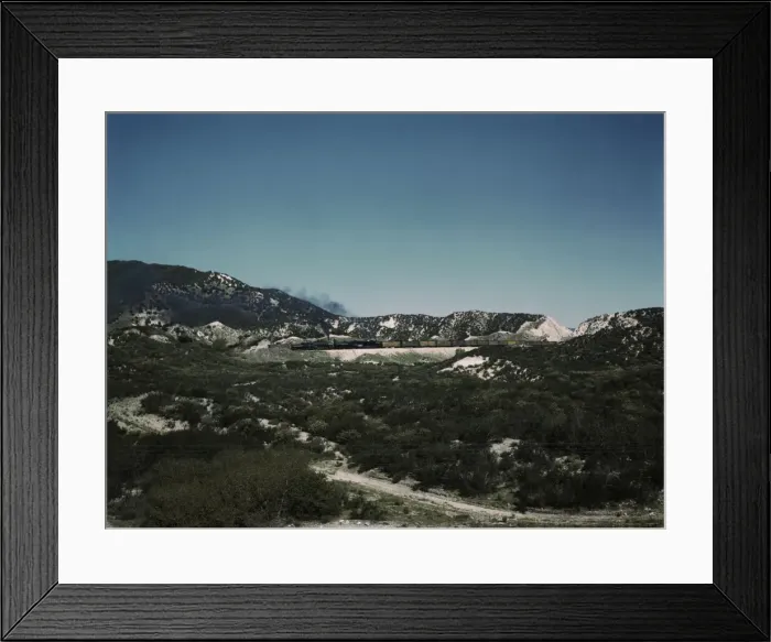 Framed Print : Freight train with two helper engines climbing the steep grade of Cajon Pass (westbound), CA. 1943. Creator: Jack Delano Framed Print : Freight train with two helper engines climbing the steep grade of Cajon Pass (westbound), CA. 1943. Creator: Jack Delano