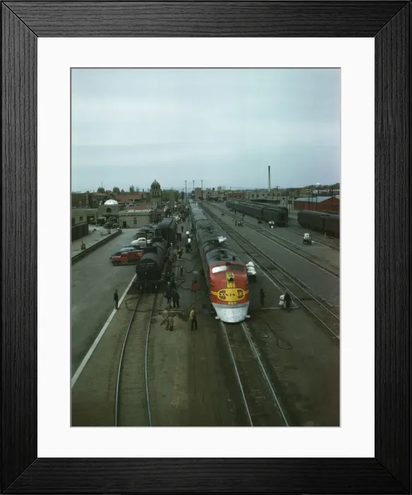 Framed Print : Santa Fe R.R. streamliner, the super Chief, being serviced... Albuquerque, N.Mexico, 1943. Creator: Jack Delano Framed Print : Santa Fe R.R. streamliner, the super Chief, being serviced... Albuquerque, N.Mexico, 1943. Creator: Jack Delano