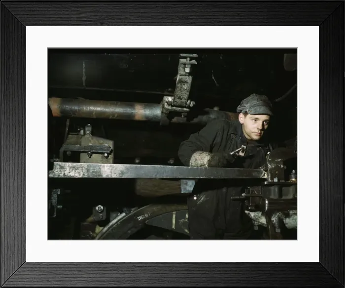 Framed Print : A young worker at the C & NW RR 40th Street shops, Chicago, Ill. 1942. Creator: Jack Delano Framed Print : A young worker at the C & NW RR 40th Street shops, Chicago, Ill. 1942. Creator: Jack Delano