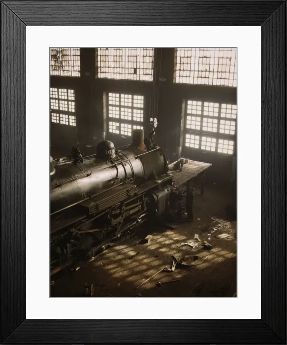 Framed Print : C & NW RR working on a locomotive at the 40th Street railroad shops, Chicago, Ill. 1942. Creator: Jack Delano Framed Print : C & NW RR working on a locomotive at the 40th Street railroad shops, Chicago, Ill. 1942. Creator: Jack Delano