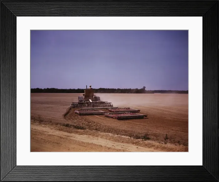 Framed Print : Harrowing a field with a diesel tractor, Seabrook Farm, Bridgeton, N. J. 1942. Creators: Marion Post Wolcott, John Collier Framed Print : Harrowing a field with a diesel tractor, Seabrook Farm, Bridgeton, N. J. 1942. Creators: Marion Post Wolcott, John Collier