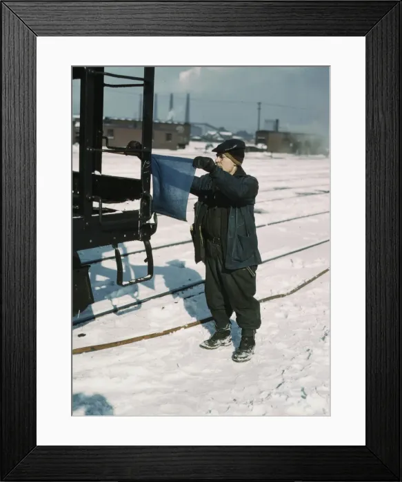 Framed Print : John Paulinski, car inspector, blue flagging a train for inspection, Corwith yard, Chicago, 1943. Creator: Jack Delano Framed Print : John Paulinski, car inspector, blue flagging a train for inspection, Corwith yard, Chicago, 1943. Creator: Jack Delano