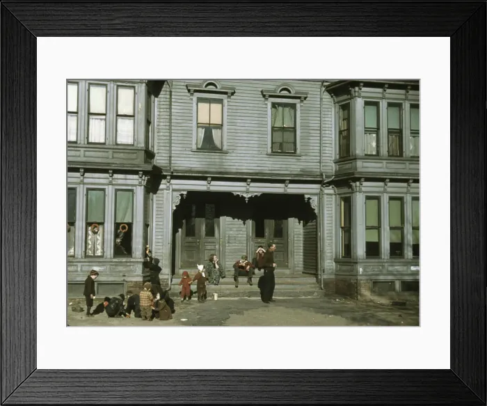 Framed Print : Children with adult in the tenement district, Brockton, Massachusetts, 1940. Creator: Jack Delano Framed Print : Children with adult in the tenement district, Brockton, Massachusetts, 1940. Creator: Jack Delano