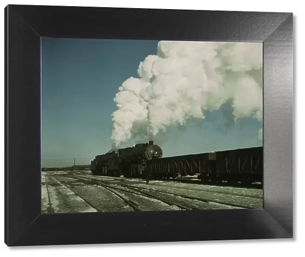 Locomotive in a railroad yard, Chicago and Northwestern RR (?), near Chicago, Ill. (?), 1942 or 1943. Creator: Jack Delano