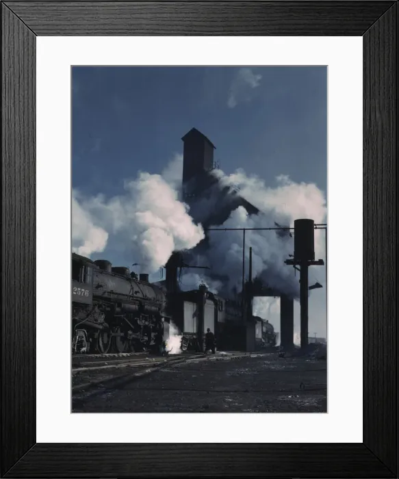 Framed Print : Locomotives over the ash pit at the roundhouse and coaling station... Chicago, Ill. 1942. Creator: Jack Delano Framed Print : Locomotives over the ash pit at the roundhouse and coaling station... Chicago, Ill. 1942. Creator: Jack Delano