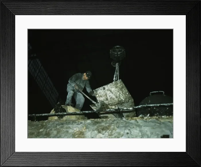 Framed Print : Spreading asbestos mixture on boiler of a locomotive, C & NW RR, 40th Street locomotive shops, 1942. Creator: Jack Delano Framed Print : Spreading asbestos mixture on boiler of a locomotive, C & NW RR, 40th Street locomotive shops, 1942. Creator: Jack Delano