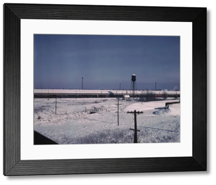 Framed Print : View of a Chicago and Northwestern railroad freight house, Chicago, Ill. 1942. Creator: Jack Delano Framed Print : View of a Chicago and Northwestern railroad freight house, Chicago, Ill. 1942. Creator: Jack Delano