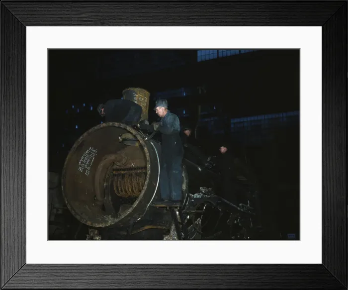 Framed Print : Working on the boiler of a locomotive at the 40th Street shops of the C & NW RR, Chicago, Ill. 1942 Creator: Jack Delano Framed Print : Working on the boiler of a locomotive at the 40th Street shops of the C & NW RR, Chicago, Ill. 1942 Creator: Jack Delano