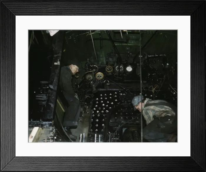 Framed Print : Working on the cab of a locomotive brought in for repair at the C & NW RR, Chicago, Ill. 1942. Creator: Jack Delano Framed Print : Working on the cab of a locomotive brought in for repair at the C & NW RR, Chicago, Ill. 1942. Creator: Jack Delano