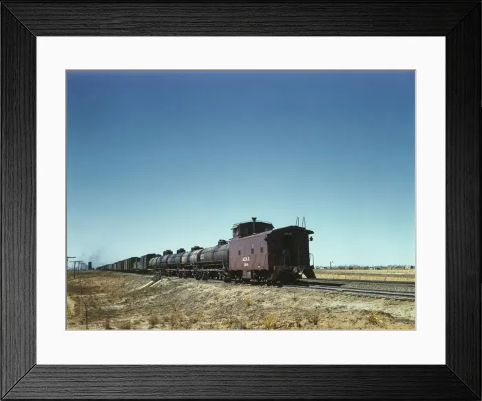 Framed Print : Santa Fe R. R. west bound freight stopping for water, Melrose, New Mexico, 1943. Creator: Jack Delano Framed Print : Santa Fe R. R. west bound freight stopping for water, Melrose, New Mexico, 1943. Creator: Jack Delano