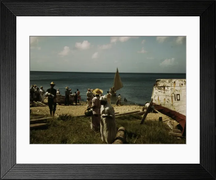 Framed Print : Housewives at the seashore waiting for the fishing boats to come in Frederiksted, V. I. 1941. Creator: Jack Delano Framed Print : Housewives at the seashore waiting for the fishing boats to come in Frederiksted, V. I. 1941. Creator: Jack Delano