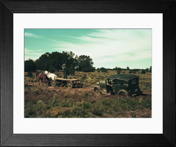 Framed Print : Team pulling a car out of the mud; the roads near Pie Town, New Mexico are not improved, 1940. Creator: Russell Lee Framed Print : Team pulling a car out of the mud; the roads near Pie Town, New Mexico are not improved, 1940. Creator: Russell Lee