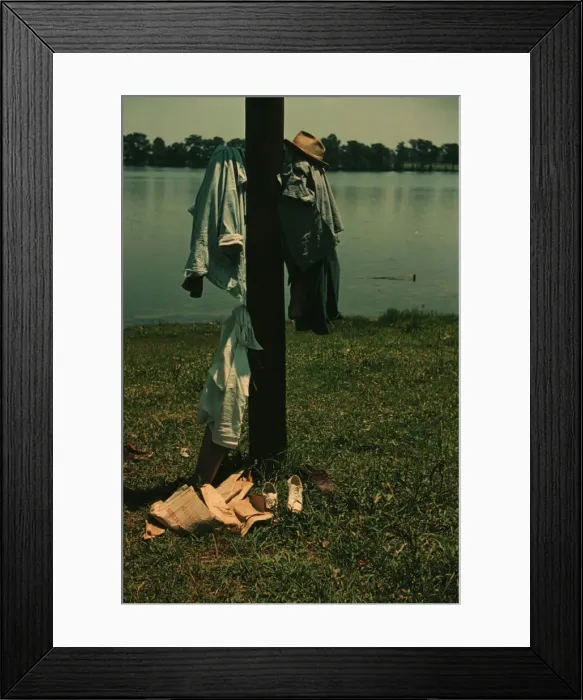 Framed Print : Clothes of swimmers hanging on a telegraph pole, Lake Providence, La. 1940. Creator: Marion Post Wolcott