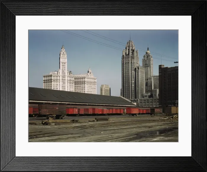 Framed Print : Trucks unloading at the inbound freight house of the Illinois Central Railroad... Chicago, Ill. 1943 Creator: Jack Delano Framed Print : Trucks unloading at the inbound freight house of the Illinois Central Railroad... Chicago, Ill. 1943 Creator: Jack Delano