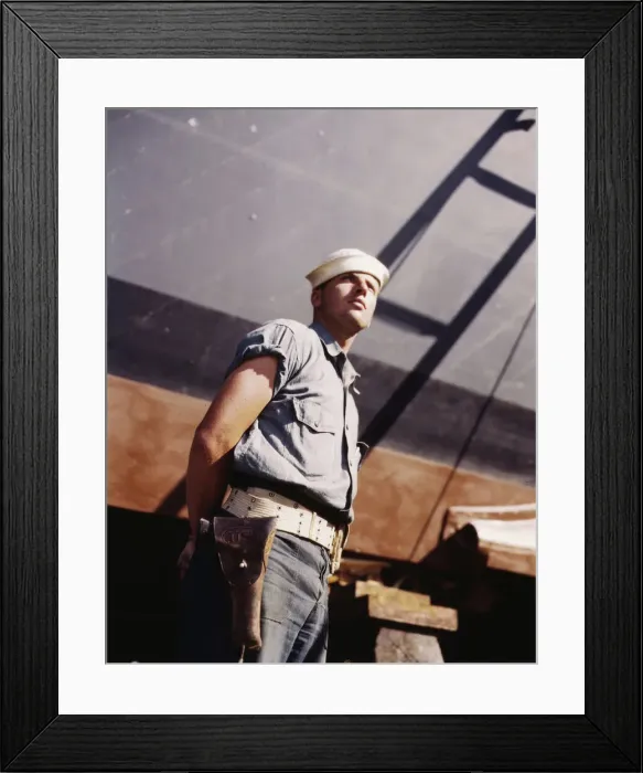 Framed Print : Coast Guardsman standing watch over 78-foot torpedo... Higgins Industries, Inc. New Orleans, 1942. Creator: Howard Hollem Framed Print : Coast Guardsman standing watch over 78-foot torpedo... Higgins Industries, Inc. New Orleans, 1942. Creator: Howard Hollem