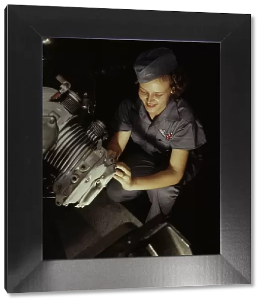 Assembly and Repairs Dept. mechanic Mary Josephine Farley works... Corpus Christi, Texas, 1942. Creator: Howard Hollem