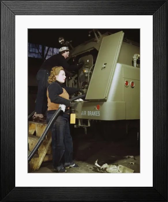 Framed Print : Helen Ryan, age 41 (with cap), widow and used to work... Heil and Co. Milwaukee, Wisconsin, 1943. Creator: Howard Hollem Framed Print : Helen Ryan, age 41 (with cap), widow and used to work... Heil and Co. Milwaukee, Wisconsin, 1943. Creator: Howard Hollem