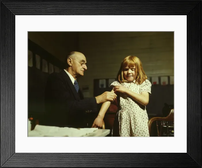 Framed Print : Dr. Schreiber of San Augustine giving a typhoid innoculation... San Augustine County, Texas, 1943. Creator: John Vachon Framed Print : Dr. Schreiber of San Augustine giving a typhoid innoculation... San Augustine County, Texas, 1943. Creator: John Vachon