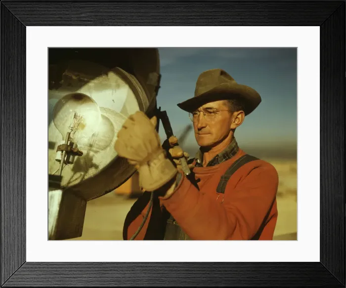Framed Print : Servicing one of the floodlights that turn night into day... Columbia Steel Co. Geneva, Utah, 1942 Creator: Andreas Feininger Framed Print : Servicing one of the floodlights that turn night into day... Columbia Steel Co. Geneva, Utah, 1942 Creator: Andreas Feininger