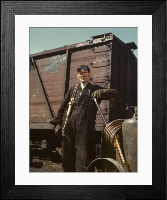 Framed Print : Mike Evans, a welder, at the rip tracks at Proviso yard of the C & NW RR, Chicago, Ill. 1943. Creator: Jack Delano Framed Print : Mike Evans, a welder, at the rip tracks at Proviso yard of the C & NW RR, Chicago, Ill. 1943. Creator: Jack Delano