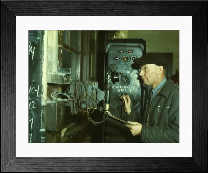 Framed Print : Hump master in a Chicago and North Western railroad yard operating a signal... Chicago, Ill. 1942. Creator: Jack Delano Framed Print : Hump master in a Chicago and North Western railroad yard operating a signal... Chicago, Ill. 1942. Creator: Jack Delano