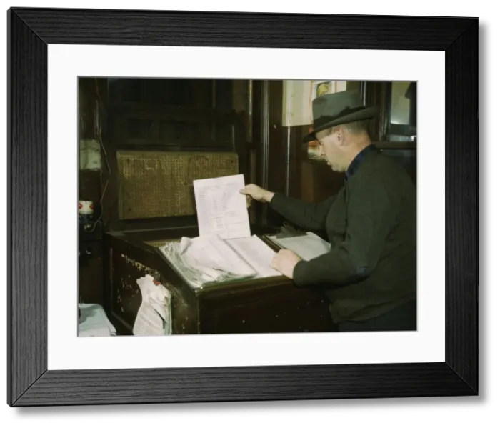 Framed Print : Switch lists coming in by teletype to the hump office at a C& NW RR yard, Chicago, Ill. 1942. Creator: Jack Delano Framed Print : Switch lists coming in by teletype to the hump office at a C& NW RR yard, Chicago, Ill. 1942. Creator: Jack Delano