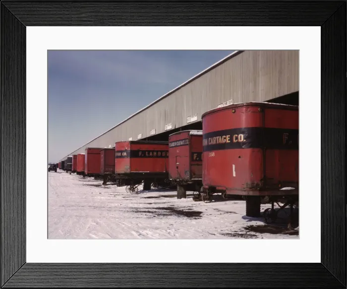 Framed Print : Truck trailers line up at a freight house to load and unload goods... C & NW RR, Chicago, Ill. 1942. Creator: Jack Delano Framed Print : Truck trailers line up at a freight house to load and unload goods... C & NW RR, Chicago, Ill. 1942. Creator: Jack Delano