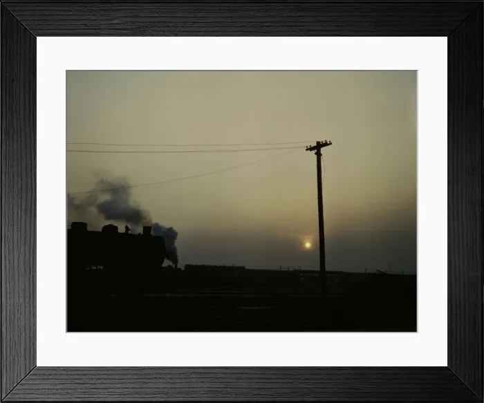 Framed Print : View in a departure yard at C & NW RRs Proviso (?) yard at twilight, Chicago, Ill. 1942. Creator: Jack Delano Framed Print : View in a departure yard at C & NW RRs Proviso (?) yard at twilight, Chicago, Ill. 1942. Creator: Jack Delano