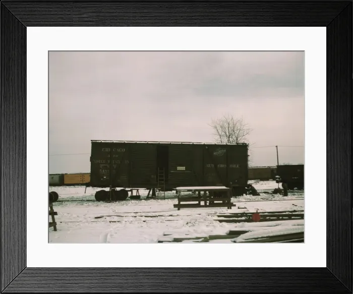 Framed Print : Car jacked up for repairs on the repair tracks, North Proviso, C & NW RR, Chicago, Ill. 1942. Creator: Jack Delano