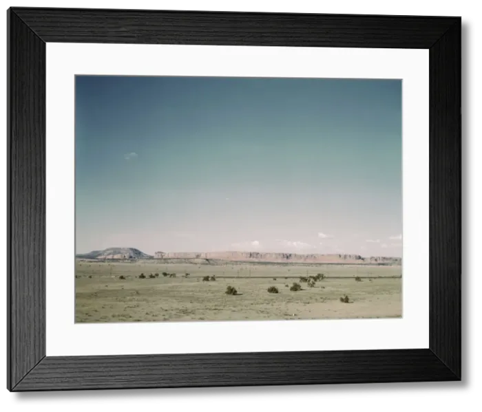 Framed Print : East bound track of the Santa Fe R. R. across desert country near South Chaves, New Mexico, 1943. Creator: Jack Delano Framed Print : East bound track of the Santa Fe R. R. across desert country near South Chaves, New Mexico, 1943. Creator: Jack Delano