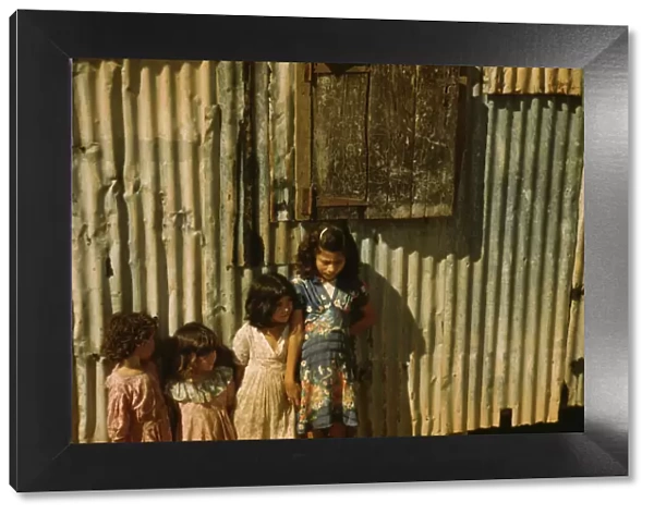 Children in a company housing settlement, Puerto Rico, 1941. Creator: Jack Delano