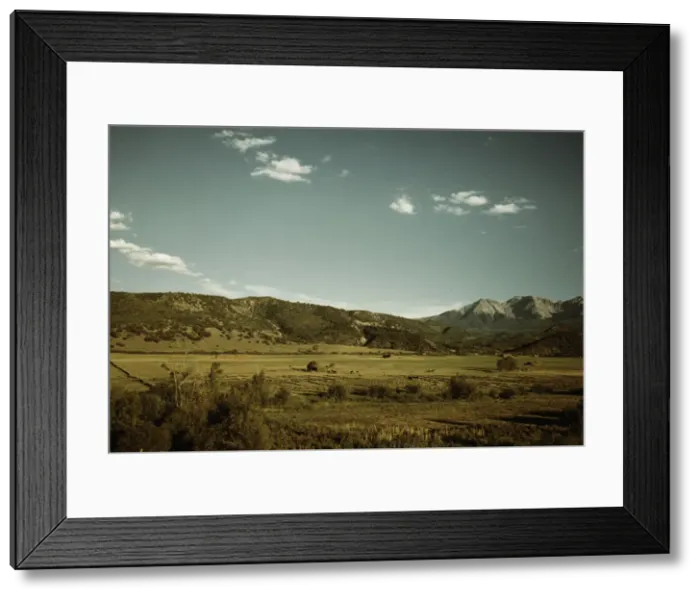 Framed Print : Farmland in the vicinity of Mt. Sneffels, Ouray County, Colorado, 1940. Creator: Russell Lee Framed Print : Farmland in the vicinity of Mt. Sneffels, Ouray County, Colorado, 1940. Creator: Russell Lee