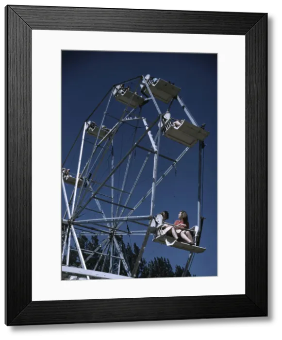 Framed Print : On the ferris wheel at the Vermont state fair, Rutland, 1941. Creator: Jack Delano Framed Print : On the ferris wheel at the Vermont state fair, Rutland, 1941. Creator: Jack Delano