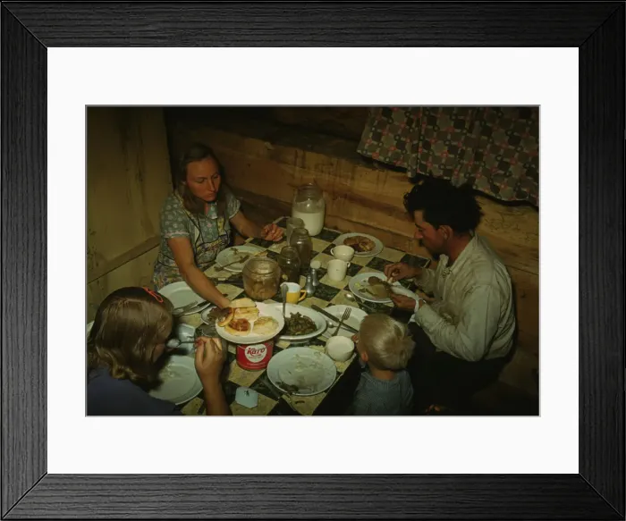 Framed Print : The Faro Caudill family eating dinner in their dugout, Pie Town, New Mexico, 1940. Creator: Russell Lee Framed Print : The Faro Caudill family eating dinner in their dugout, Pie Town, New Mexico, 1940. Creator: Russell Lee