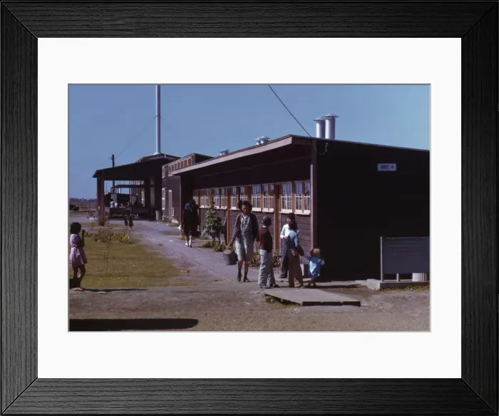 Framed Print : Gardens are planted in front of the row shelters, FSA... labor camp, Robstown, Tex. 1942. Creator: Arthur Rothstein Framed Print : Gardens are planted in front of the row shelters, FSA... labor camp, Robstown, Tex. 1942. Creator: Arthur Rothstein
