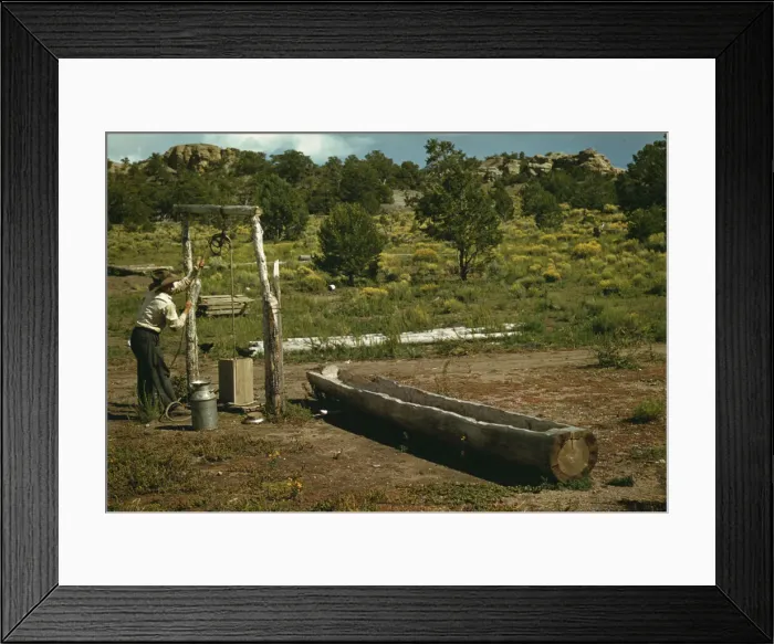 Framed Print : Faro Caudill drawing water from his well, Pie Town, New Mexico, 1940. Creator: Russell Lee Framed Print : Faro Caudill drawing water from his well, Pie Town, New Mexico, 1940. Creator: Russell Lee