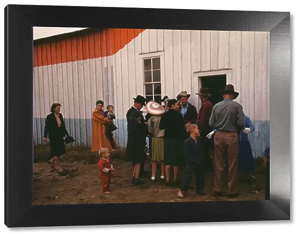 Group of homesteaders in front of the bean house... Pie Town, New Mexico Fair, 1940. Creator: Russell Lee