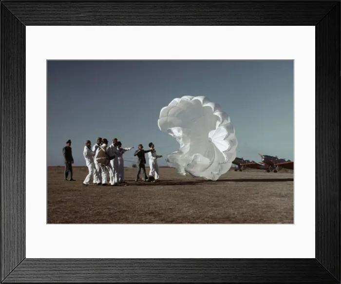 Framed Print : Instructor explaining the operation of a parachute to student pilots, Fort Worth, Tex. 1942. Creator: Arthur Rothstein Framed Print : Instructor explaining the operation of a parachute to student pilots, Fort Worth, Tex. 1942. Creator: Arthur Rothstein