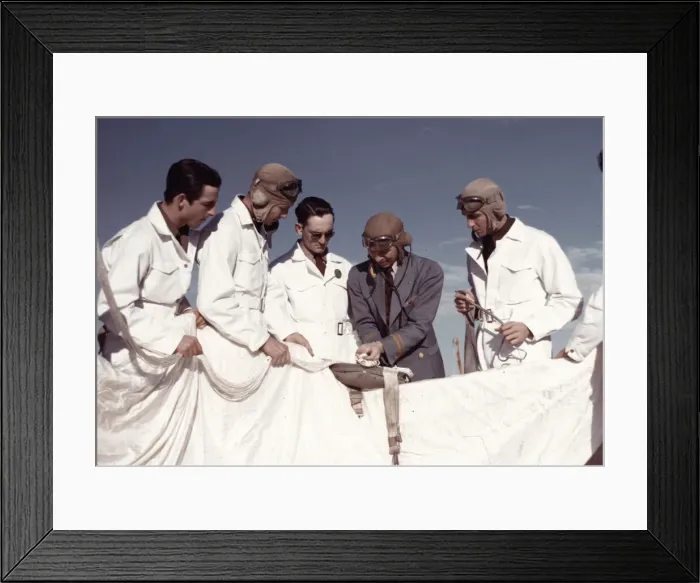 Framed Print : Instructor explaining the operation of a parachute to student pilots, Fort Worth, Tex. 1942. Creator: Arthur Rothstein Framed Print : Instructor explaining the operation of a parachute to student pilots, Fort Worth, Tex. 1942. Creator: Arthur Rothstein